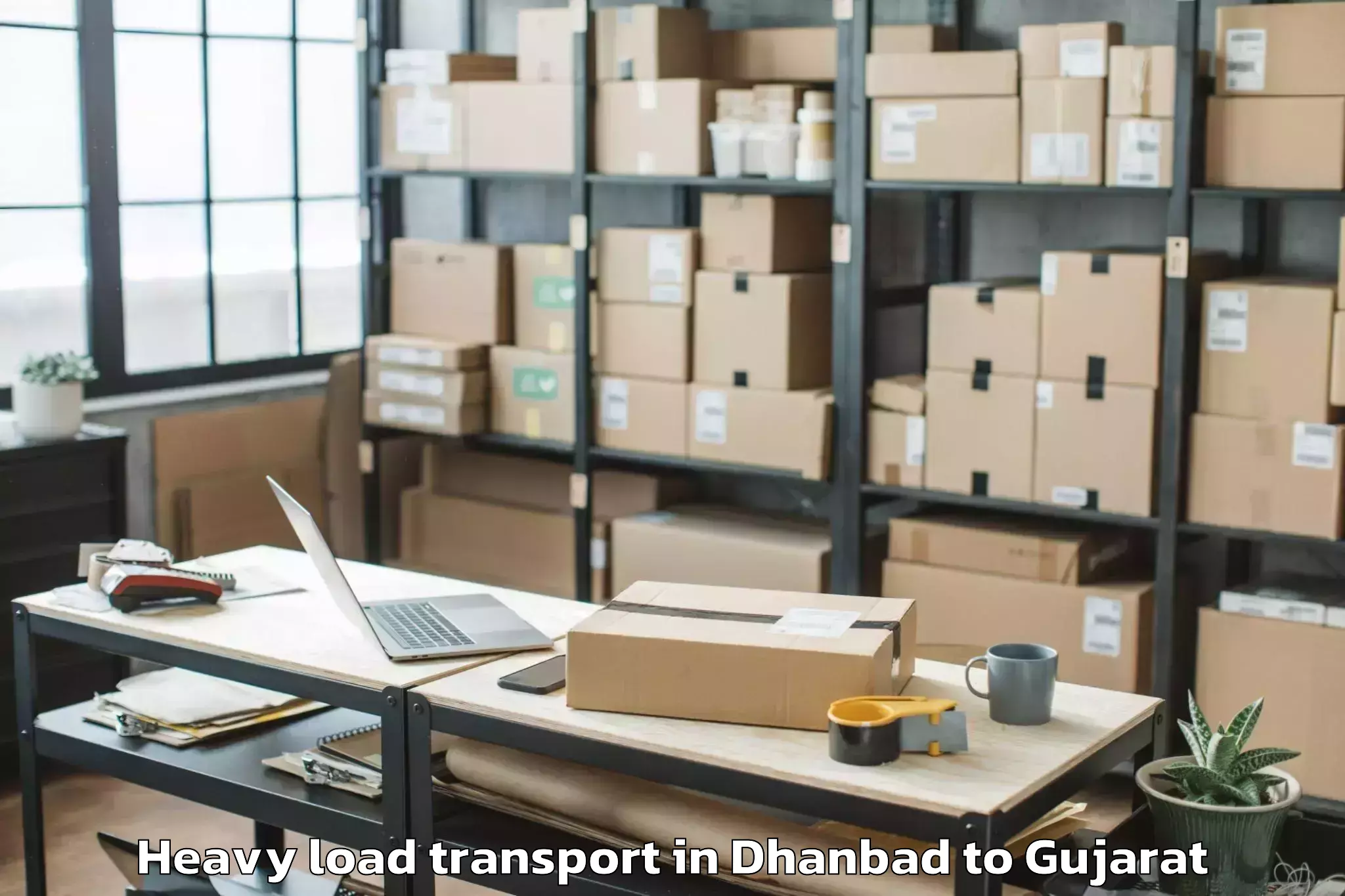 Easy Dhanbad to Modasa Heavy Load Transport Booking